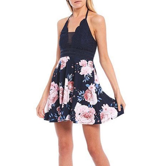 Xtraordinary Dresses & Skirts - Small navy backless floral mini dress